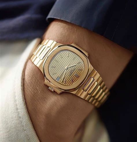 patek philippe solid gold watch.